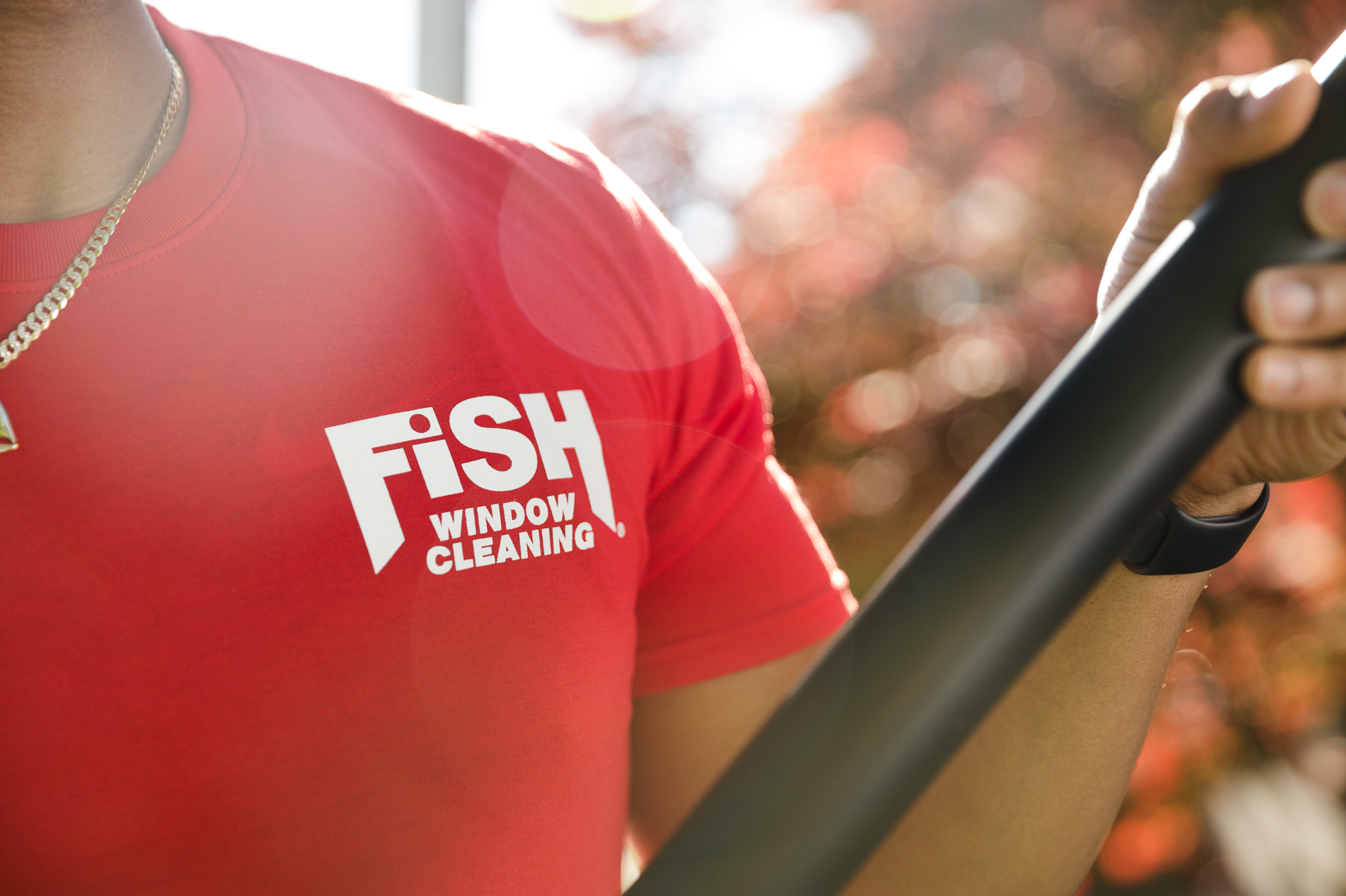 Fish Window Cleaning Logo on Chest of Shirt